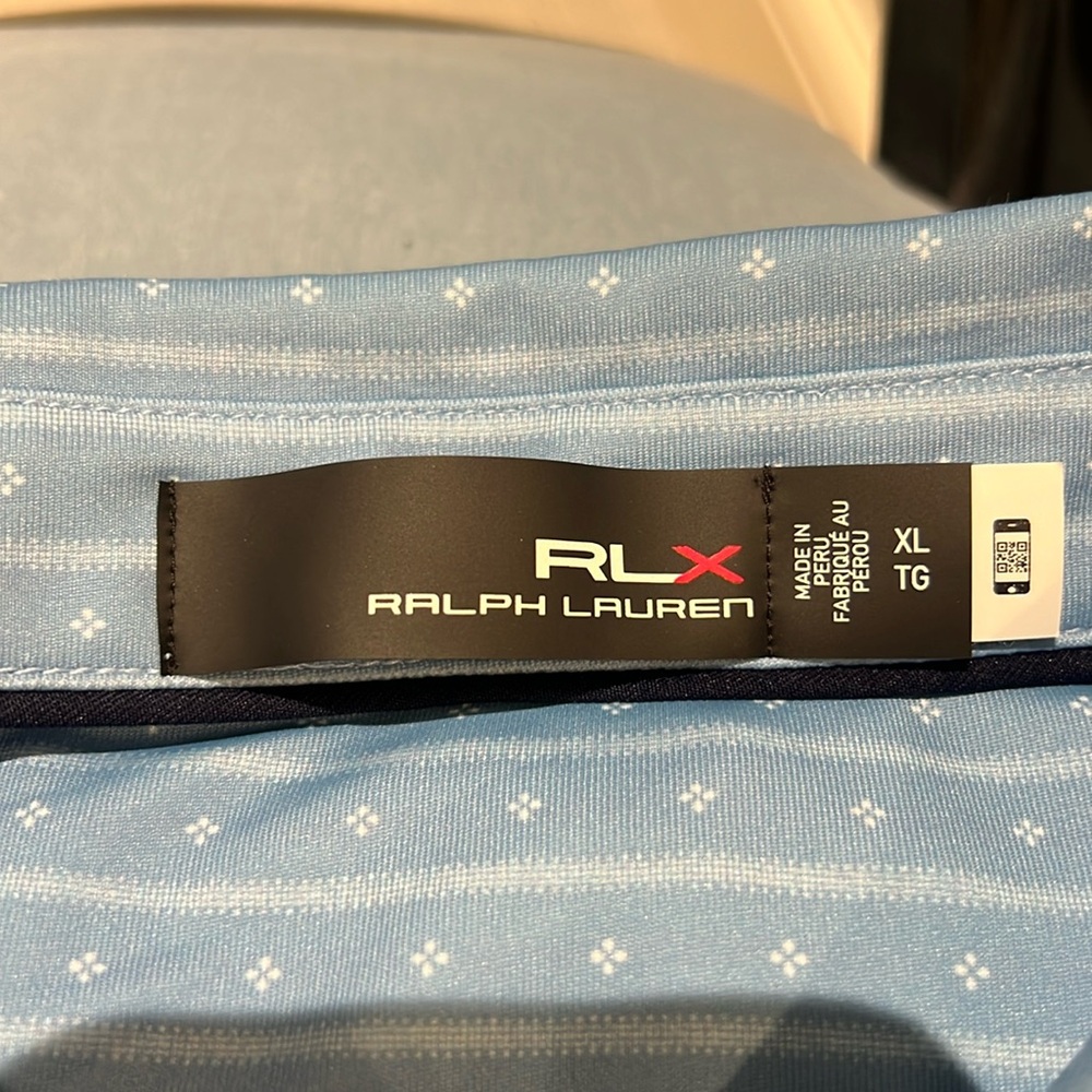 RLX men’s golf shirt with pebble beach insignia